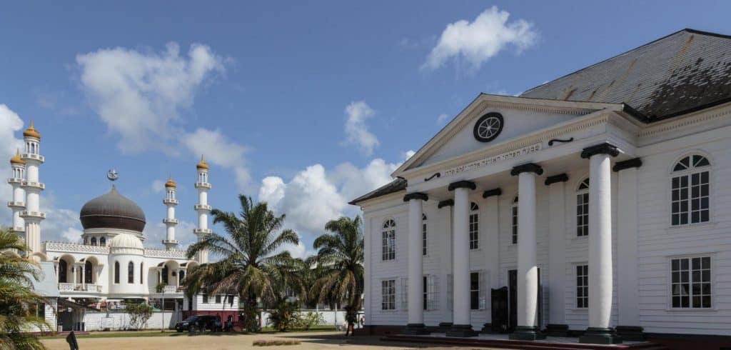 In the Keizerstraat, the largest mosque in the Caribbean is right next to a little less synagogue